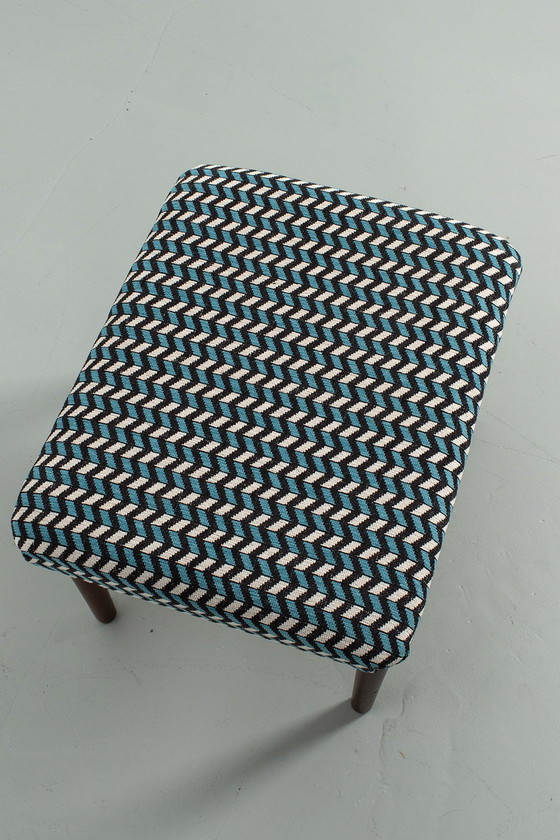 Image 1 of Footstool reupholstered with graphic pattern