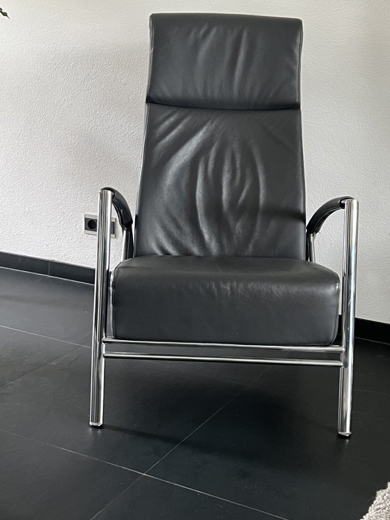 Image 1 of Fauteuil inclinable Harvink en cuir avec pouf