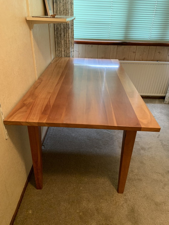 Image 1 of Art of living cherry wood dining table