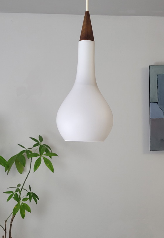 Image 1 of Lámpara colgante de opalina y teca de Louis Kalff, década de 1960