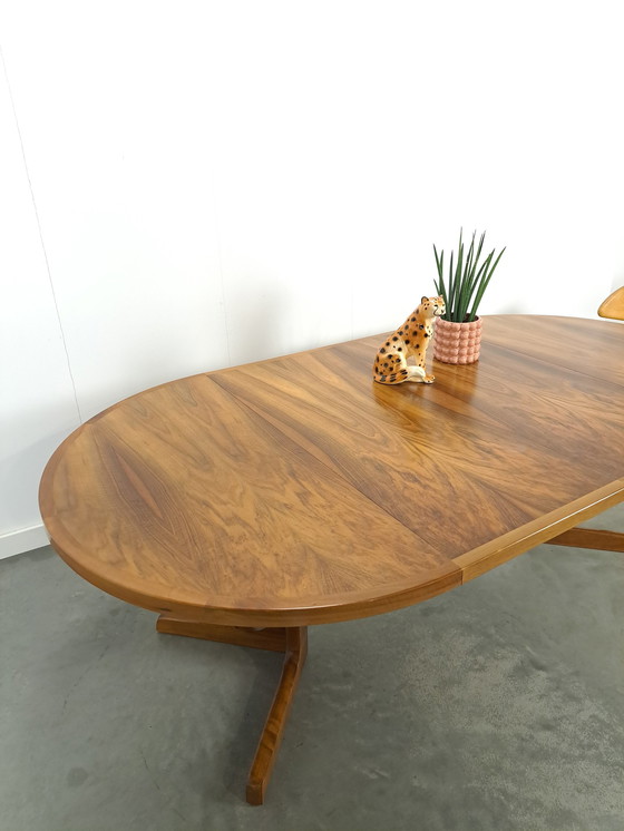 Image 1 of Large round walnut extendable dining table