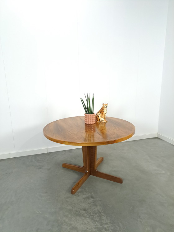 Image 1 of Large round walnut extendable dining table