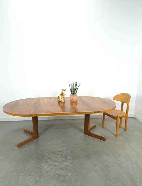 Image 1 of Large round walnut extendable dining table