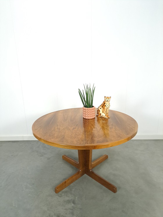 Image 1 of Large round walnut extendable dining table