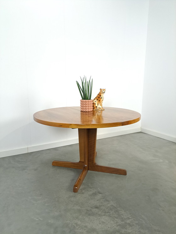 Image 1 of Large round walnut extendable dining table