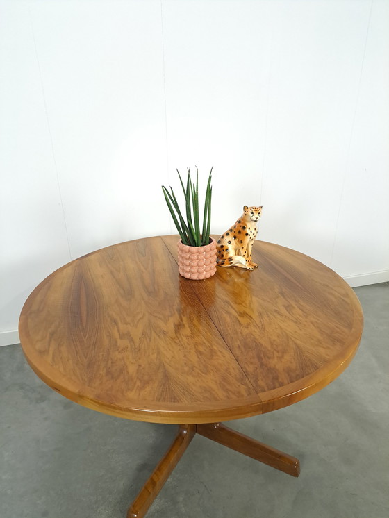 Image 1 of Large round walnut extendable dining table