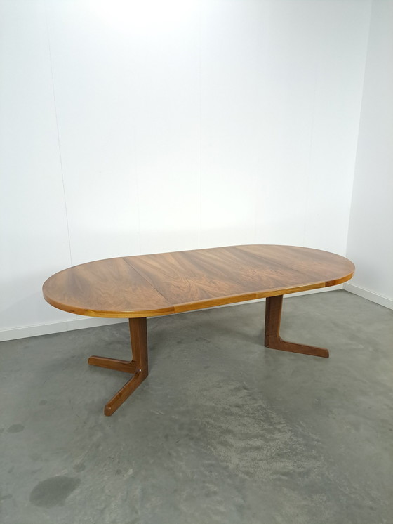 Image 1 of Large round walnut extendable dining table