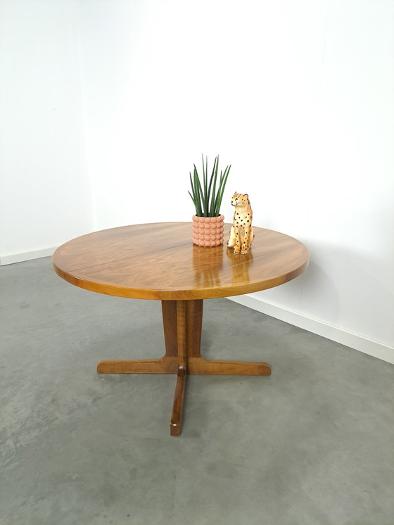 Image 1 of Large round walnut extendable dining table