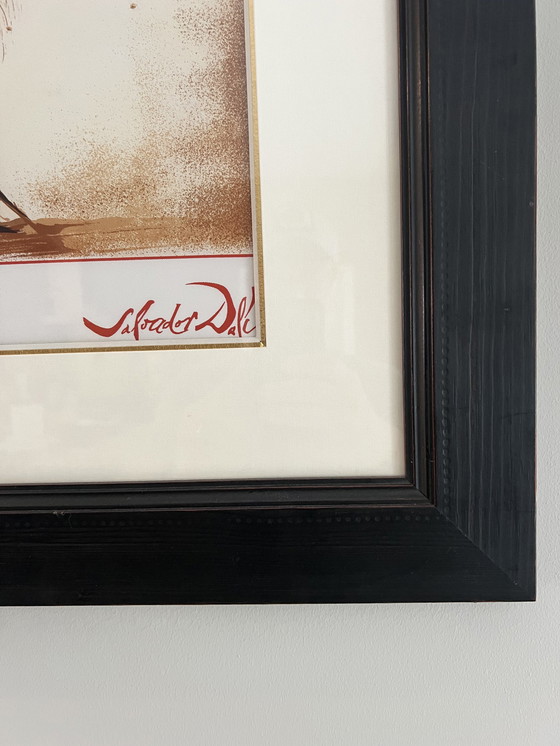 Image 1 of Salvadore Dali print on silk in dark wood frame