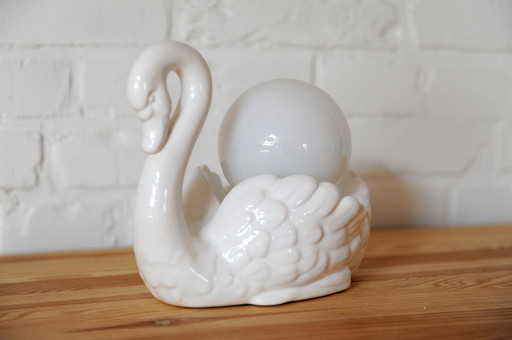 Sculptural porcelain table lamp in the shape of a swan