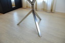 Dining table with stainless steel base