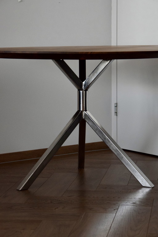 Dining table with stainless steel base