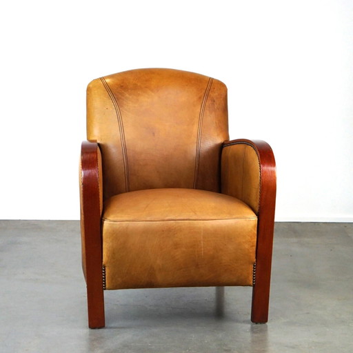 Fauteuil Artdeco en cuir avec accoudoirs en bois