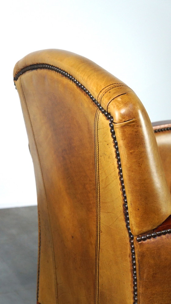 Image 1 of Beef leather Artdeco design armchair with wooden armrests