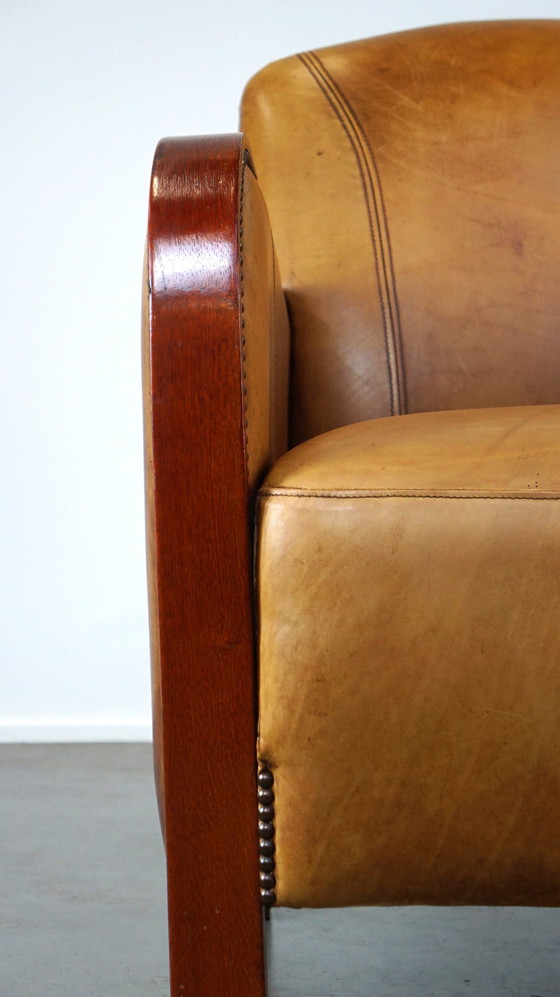 Image 1 of Fauteuil Artdeco en cuir avec accoudoirs en bois