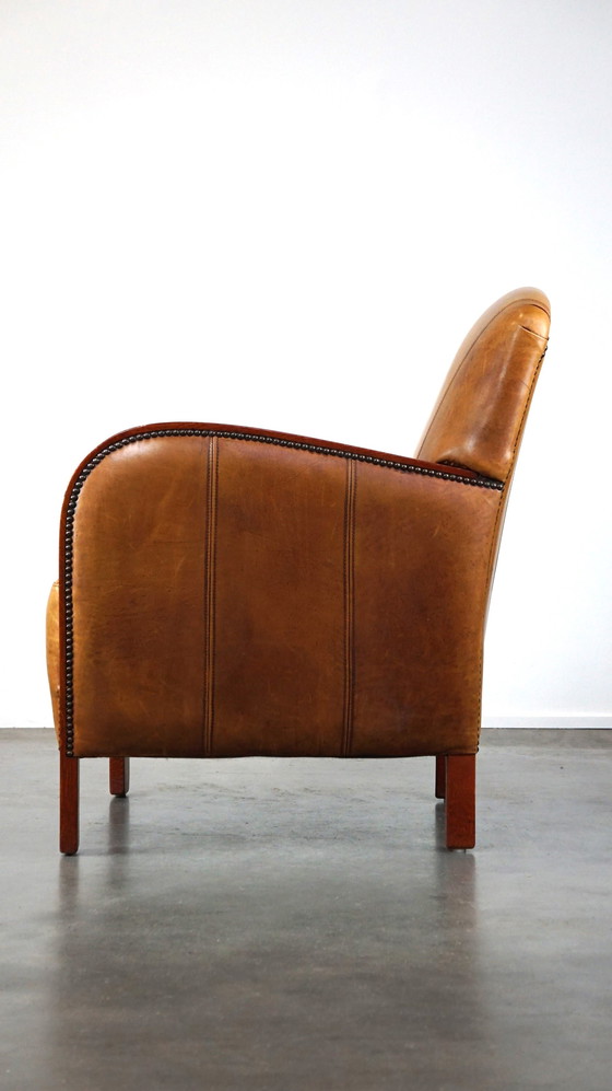 Image 1 of Fauteuil Artdeco en cuir avec accoudoirs en bois