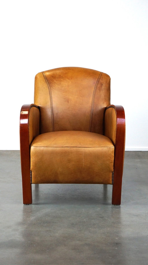 Fauteuil Artdeco en cuir avec accoudoirs en bois