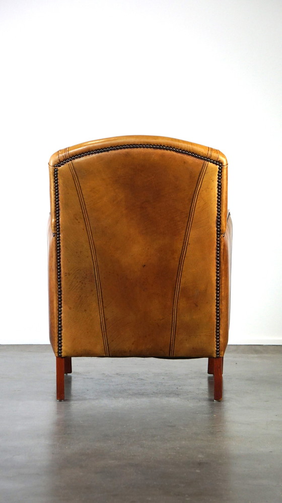 Image 1 of Fauteuil Artdeco en cuir avec accoudoirs en bois