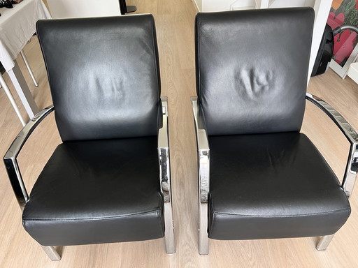 2 fauteuils en cuir noir Montel