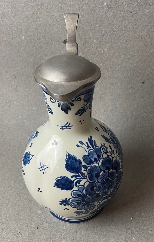 Antique Delft pear jug with pewter mount