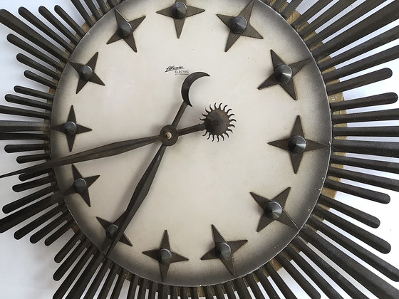 Image 1 of Starburst Atlanta wall clock