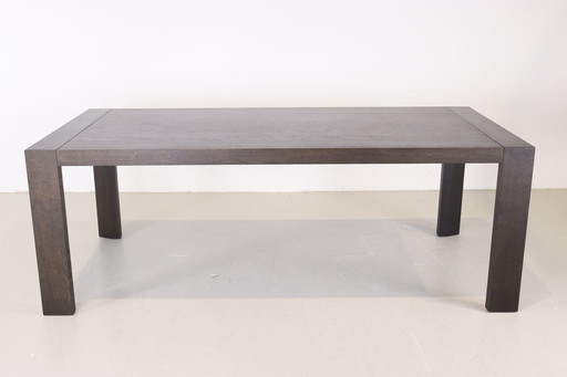 Arco Extenso dining table in black oak