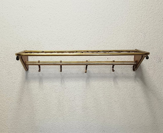 Image 1 of sixties string coat rack with teak