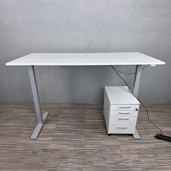 Image 1 of Kinnarps electric sit/stand desk incl. drawer unit