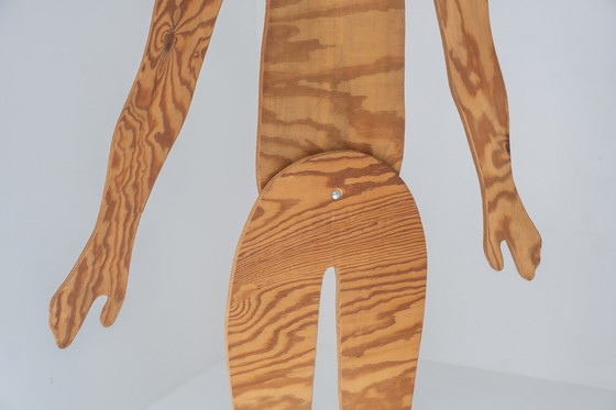 Image 1 of A set of three mannequins made out of plywood, dating from the 1980s. 