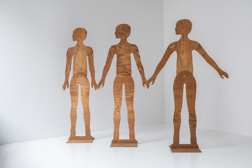 A set of three mannequins made out of plywood, dating from the 1980s. 