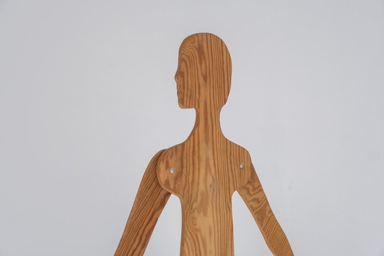 Image 1 of A set of three mannequins made out of plywood, dating from the 1980s. 