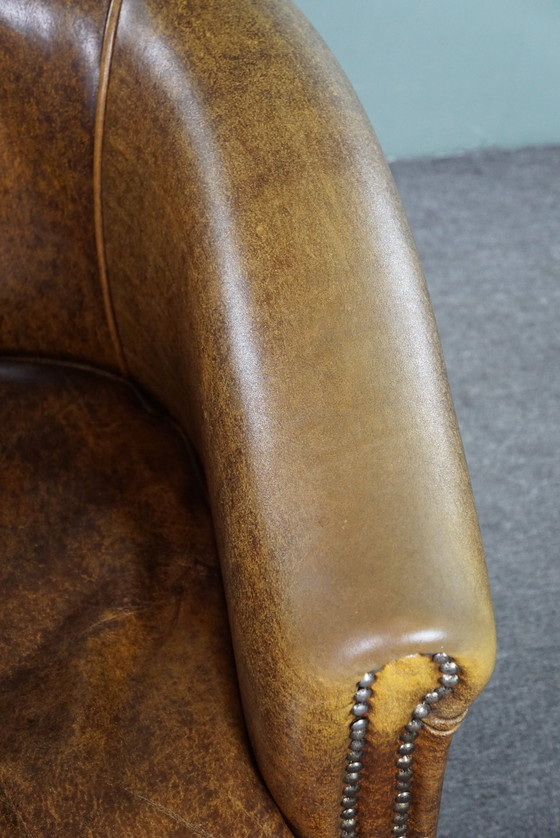 Image 1 of Leather club chair with decorative studs