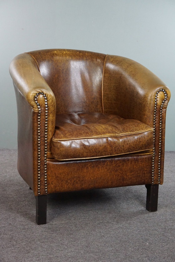 Image 1 of Leather club chair with decorative studs