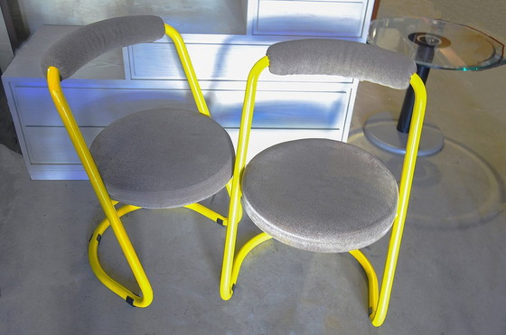 Image 1 of 2 Yellow Metal Chairs