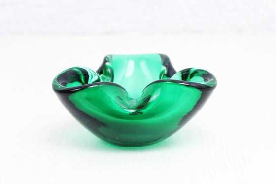 Image 1 of Beautiful Murano glass ashtray in gold color.