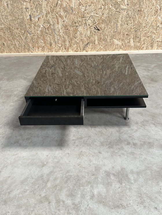 Image 1 of A Generous And Stylish Coffee Table With A High Gloss Finish In Black.