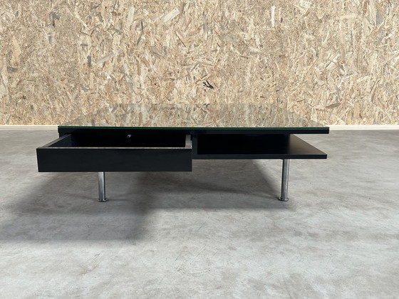 Image 1 of A Generous And Stylish Coffee Table With A High Gloss Finish In Black.