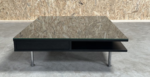 A Generous And Stylish Coffee Table With A High Gloss Finish In Black.