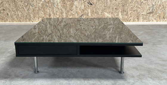 Image 1 of A Generous And Stylish Coffee Table With A High Gloss Finish In Black.