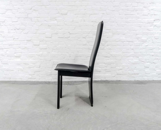 Image 1 of 4 Mid-Century black saddle leather dining room chairs with high backrest in the style of Cidue