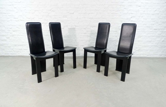 Image 1 of 4 Mid-Century black saddle leather dining room chairs with high backrest in the style of Cidue