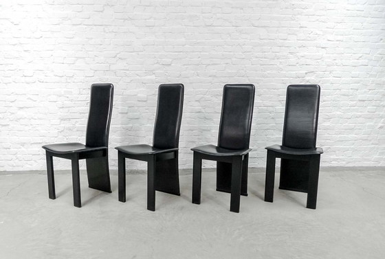 Image 1 of 4 Mid-Century black saddle leather dining room chairs with high backrest in the style of Cidue