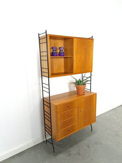 Modular Standing Wall Rack With Cabinets With Drawers And Black Steel Holders