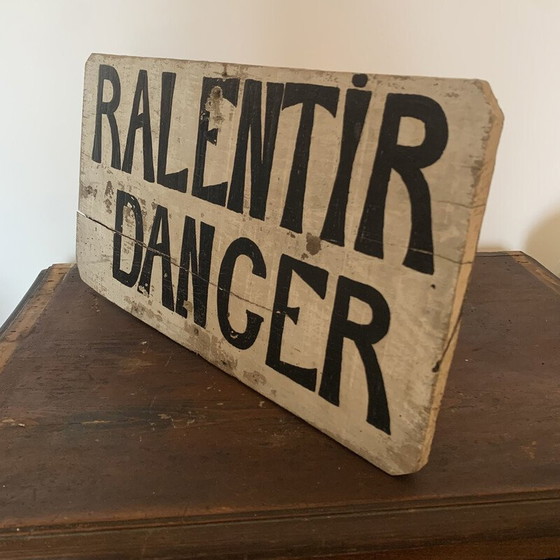 Image 1 of Vintage wooden "slow down danger" sign