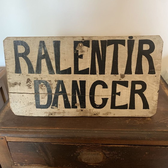 Image 1 of Vintage wooden "slow down danger" sign