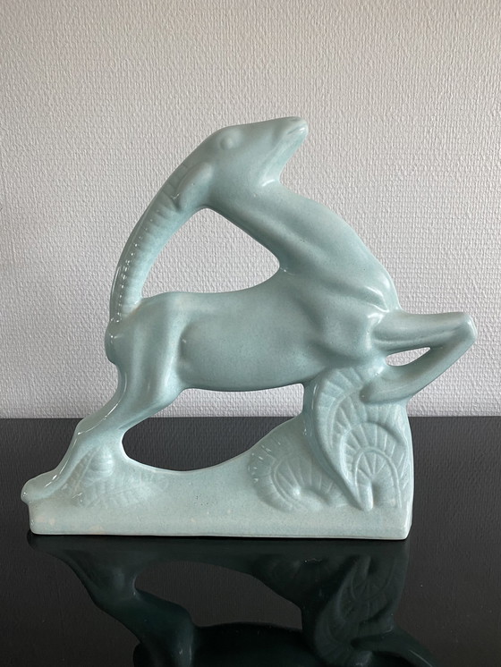 Image 1 of Ceramic Animals: 2 Jumping Capricorns