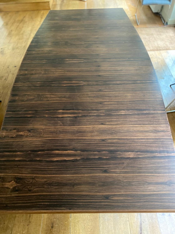 Image 1 of Mid - Century rosewood veneer dining table with steel legs