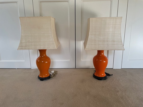 Image 1 of Two Orange Ceramic Table Lamps