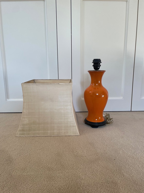 Image 1 of Two Orange Ceramic Table Lamps