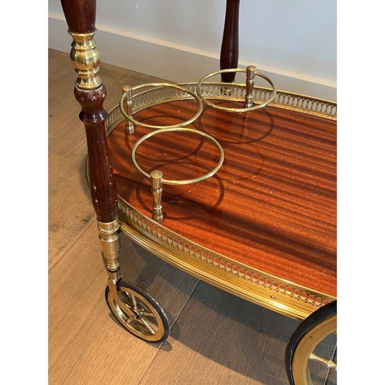Image 1 of Vintage oval brass and mahogany table on wheels by Maison Baguès, 1940